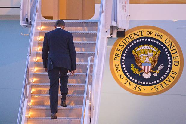 President Barack Obama boards Air Force One to depart McCarran International Airport Wednesday, Sept. 12, 2012.  Obama rallied supporters during a campaign stop at the Cashman Center.