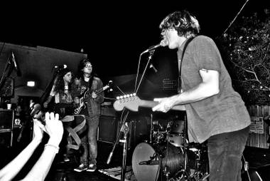 Ty Segall (right) performs at the Bunkhouse during Neon Reverb on Tuesday.