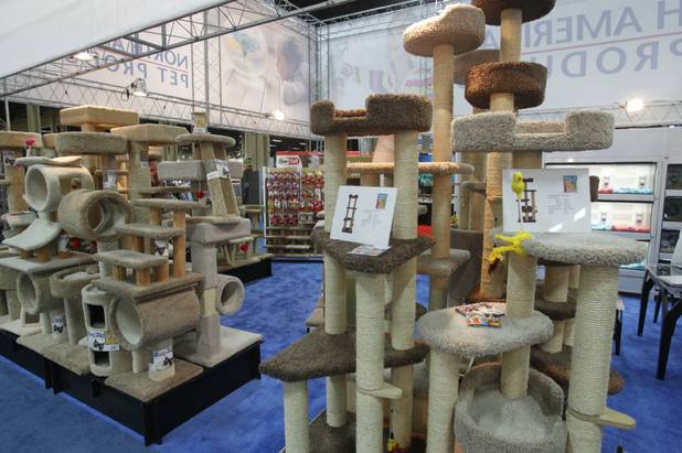 Multi-level cat trees on display at the North American Pet Products booth during SuperZoo, a trade show for the pet industry, at the Mandalay Bay Convention Center Tuesday, Sept. 11, 2012. 