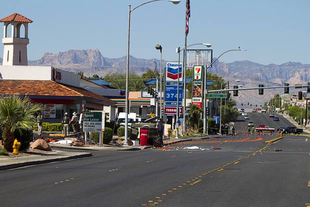 Metro Police investigate after a car crashed into a bus stop on Spring Mountain Road east of Decatur Boulevard, killing four people, on Thursday, Sept. 13, 2012. Photo is looking wear on Spring Mountain Road toward Decatur Boulevard.