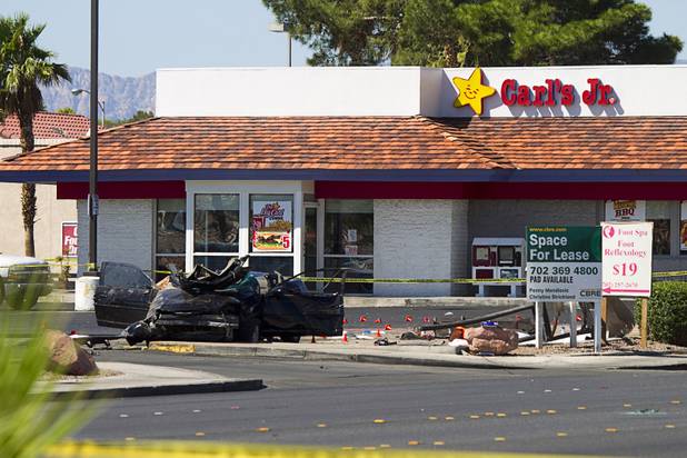 A view of  car that crashed into a bus stop on Spring Mountain Road east of Decatur Boulevard, killing four people, on Thursday, Sept. 13, 2012.