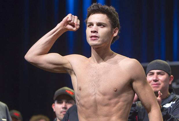 WBC middleweight champion Julio Cesar Chavez Jr., son of boxing legend Julio Cesar Chavez, celebrates after making weight during an official weigh-in at the Wynn Las Vegas Resort in Las Vegas, Nevada Sept. 14, 2012. Chavez will defend his title against Sergio Martinez of Argentina at the Thomas & Mack Center in Las Vegas September 15.