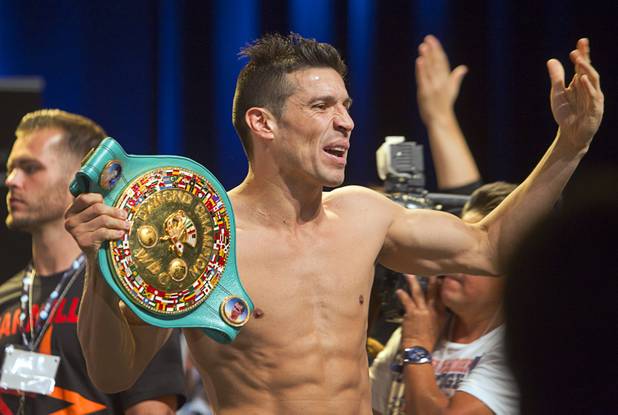 Boxer Sergio Martinez of Argentina encourages his fans fans to cheer during an official weigh-in at the Wynn Las Vegas Resort in Las Vegas, Nevada Sept. 14, 2012. Martinez will challenge WBC middleweight champion Julio Cesar Chavez Jr., son of boxing legend Julio Cesar Chavez, at the Thomas & Mack Center in Las Vegas September 15.