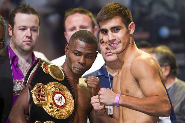 WBA Super Bantamweight champion Guillermo Rigondeaux (L) of Cuba and Roberto Marroquin of the U.S. pose during an official weigh-in at the Wynn Las Vegas Resort in Las Vegas, Nevada Sept. 14, 2012. Rigondeaux will defend his title against Marroquin at the Thomas & Mack Center in Las Vegas September 15.