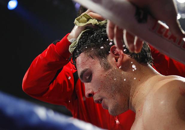 Julio Cesar Chavez Jr. of Mexico is treated in his corner between rounds during his bout against Sergio Martinez of Argentina at the Thomas & Mack Center in Las Vegas, Nevada Sept. 15, 2012.