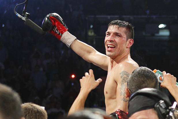 Sergio Martinez of Argentina celebrates his victory over WBC middleweight champion Julio Cesar Chavez Jr. of Mexico after their title fight at the Thomas & Mack Center in Las Vegas, Nevada Sept. 15, 2012.