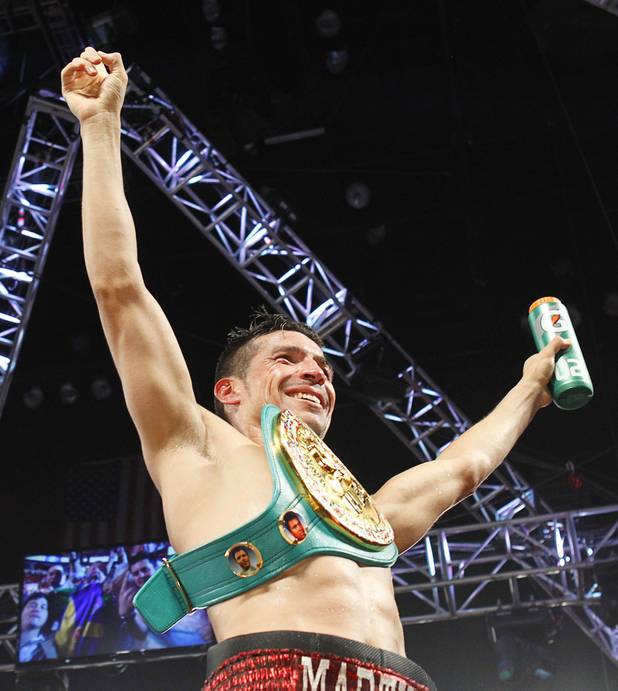 Sergio Martinez of Argentina celebrates his victory over WBC middleweight champion Julio Cesar Chavez Jr. of Mexico after their title fight at the Thomas & Mack Center in Las Vegas, Nevada Sept. 15, 2012.
