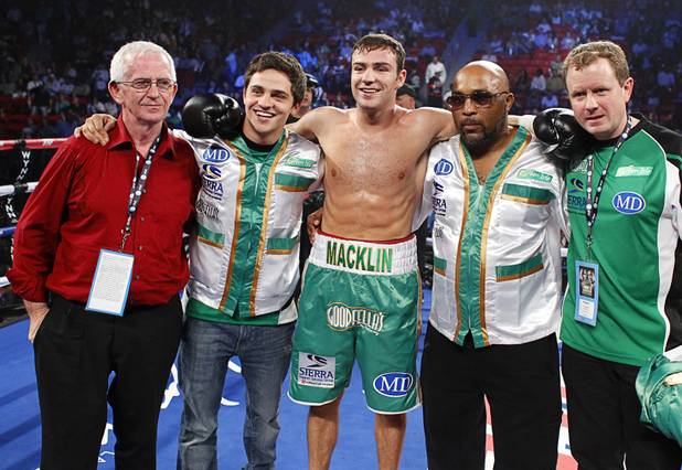 Matthew Macklin (C) of England poses with members of his camp after defeating Joachim Alcine of Canada in a middleweight bout at the Thomas & Mack Center in Las Vegas, Nevada Sept. 15, 2012. Macklin won with a first round TKO.
