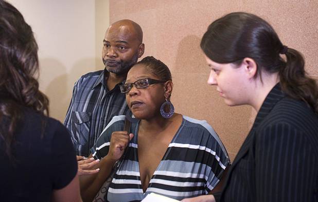 Lechtrianna Hosey and her husband Gary Hosey Sr. speak to reporters after their son's initial appearance at the Regional Justice Center Monday, Sept. 17, 2012. Gary Lee Hosey Jr. is the suspected driver of the car that crashed Thursday into the bus stop on Spring Mountain Road, killing four people. Attorney Caitlyn McAmis is at right.