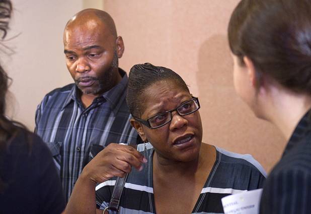 Lechtrianna Hosey, center, speaks to her son's attorney Caitlyn McAmis after Gary Lee Hosey Jr.'s initial appearance at the Regional Justice Center Monday, Sept. 17, 2012. Gary Lee Hosey Jr. is the suspected driver of the car that crashed into the bus stop on Spring Mountain Road Thursday killing four people. Gary Hosey Sr. is at left.