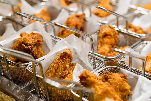 Baskets of Wicked fried chicken are displayed at the Wicked Spoon buffet in the Cosmopolitan Tuesday, Sept. 18, 2012.