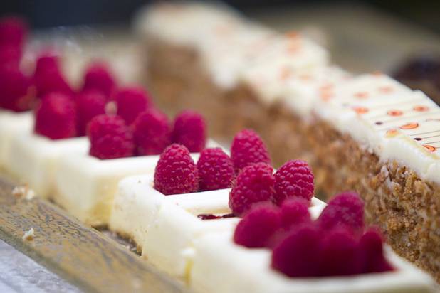 Lemon rasberry cheese cakes are displayed in a dessert station at the Wicked Spoon buffet in the Cosmopolitan Tuesday, Sept. 18, 2012.