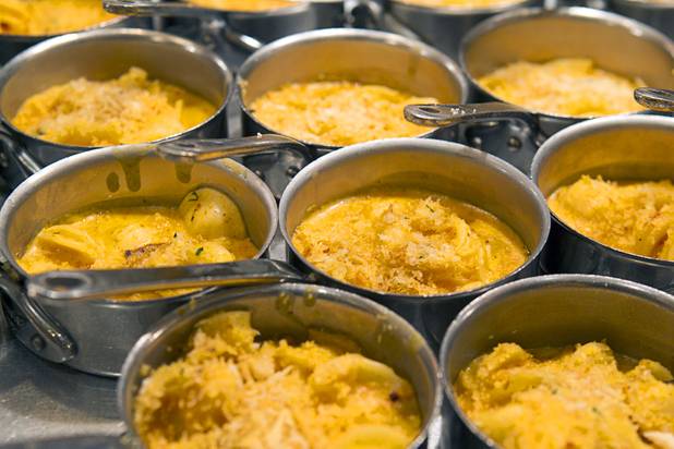 Mini skillets of "Angry" (little spicy) mac & cheese are displayed at the Wicked Spoon buffet in the Cosmopolitan Tuesday, Sept. 18, 2012.