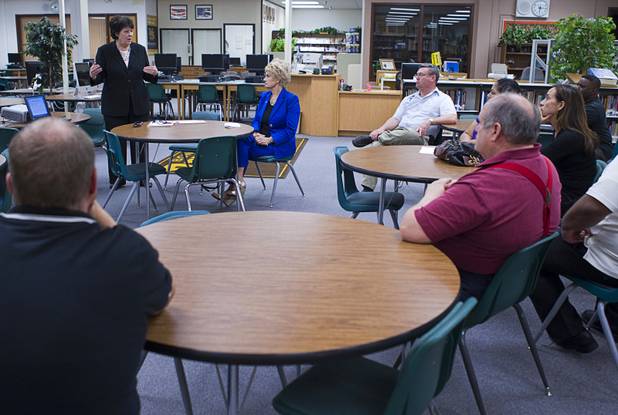 Joyce Haldeman, left, Clark County School District associate superintendent for community and government relations, speaks during an informational meeting at the Bonanza High School library Tuesday, Sept. 18, 2012. CCSD officials answered questions related to a property tax initiative that will be on the ballot in November.  The six-year capital levy, if approved, will raise $669 million for high-need school maintenance and renovations. 