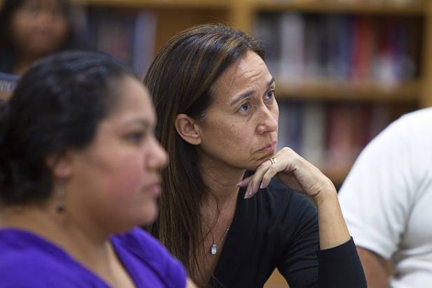 Linda Johnson listens during a Clark County School District informational meeting at the Bonanza High School library Tuesday, Sept. 18, 2012. CCSD officials answered questions related to a property tax initiative that will be on the ballot in November. The six-year capital levy, if approved, will raise $669 million for high-need school maintenance and renovations. 