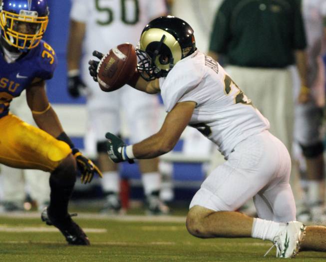 Colorado State's Joe Hansley (right) fumbles the ball as Cullen Newsome recovers it during San Jose State's 40-20 victory on Saturday, Sept. 15, 2012, in San Jose, Calif.