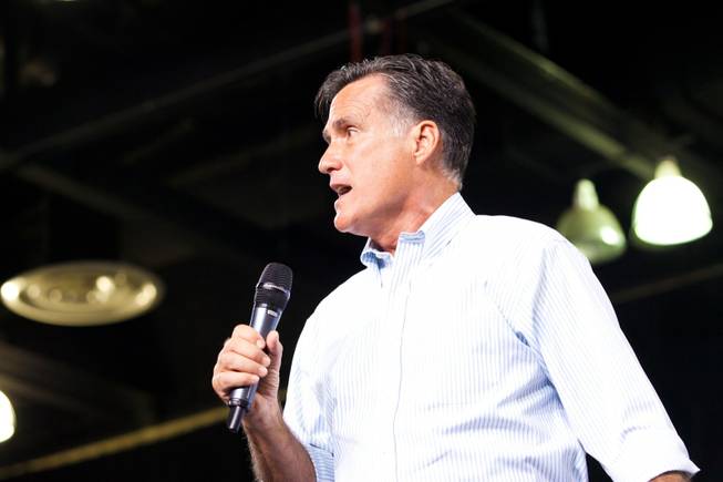 Presidential hopeful Mitt Romney speaks to supporters during a rally at the Cox Pavilion, UNLV, Friday Sept. 21, 2012.