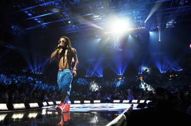 Lil Wayne performs during the first night of the 2012 iHeart Radio Music Festival in MGM Grand Garden Arena on Friday, Sept. 21, 2012.