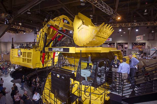 Mining equipment is displayed at the Caterpillar booth during MINExpo International 2012 trade show at the Las Vegas Convention Center Monday, Sept. 24, 2012.