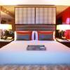 This is a bedroom in one of the MGM Grand's remodeled suites Thursday, Sept. 27, 2012.