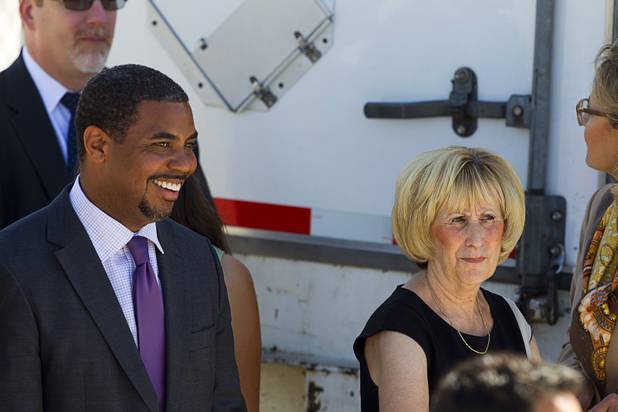 Steven Horsford, Nevada senate majority leader, and Clark County Commission Chairwoman Susan Brager wait for President Barack Obama at McCarran International Airport Sunday, Sept. 30, 2012. Obama will attend a campaign rally then stay in Henderson as he prepares for his first debate with Republican presidential candidate Mitt Romney. The debate will be held in Colorado Wednesday.