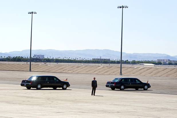 President Barack Obama leaves McCarran International Airport in one of two identical presidential limousines Sunday, Sept. 30, 2012. Obama will attend a campaign rally then stay in Henderson as he prepares for his first debate with Republican presidential candidate Mitt Romney. The debate will be held in Colorado Wednesday.