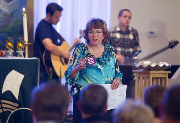 Pastor Marta Poling-Goldenne speaks to the congregation before intern Pastor Kaitlyn Ferguson's first morning of preaching at New Song Church in Henderson Sunday, Sept. 30, 2012.
