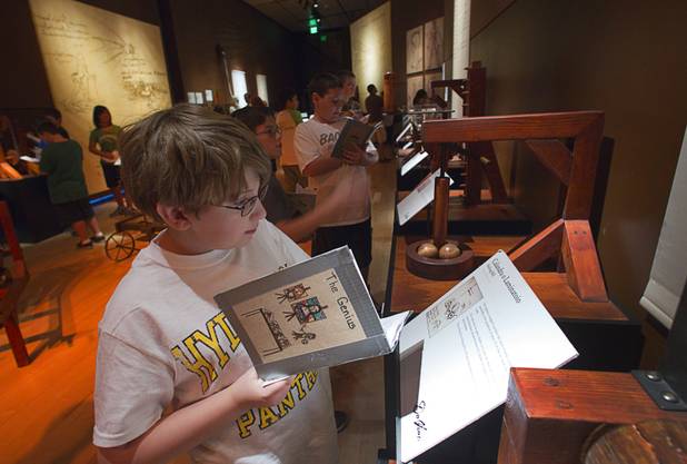 Hyde Park Middle School student Ethan French looks over a reproduction of a rolling mill during a visit to the "Da Vinci- The Genius" exhibit at the Imagine Gallery in the Venetian Monday, Oct. 1, 2012. This week, all Hyde Park sixth graders, who have been studying about  Leonardo Da Vinci for about a month, will visit the exhibit. The traveling exhibit has been extended through January, a representative said.