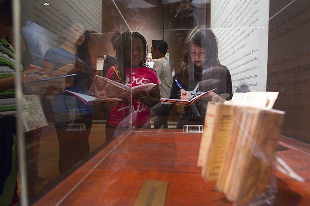 Hyde Park Middle School students look over artifacts during a visit to the "Da Vinci- The Genius" exhibit at the Imagine Gallery in the Venetian Monday, Oct. 1, 2012. This week, all Hyde Park sixth graders, who have been studying about  Leonardo Da Vinci for about a month, will visit the exhibit. The traveling exhibit has been extended through January, a representative said.