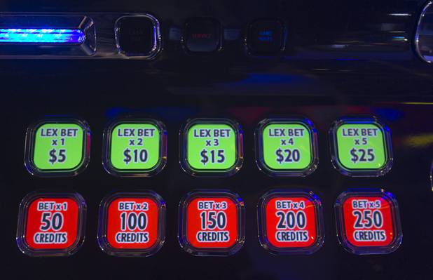Bet buttons are shown on a Superman-themed slot machine at the Aristocrat booth during the Global Gaming Expo (G2E) at the Sands Expo Center Tuesday, Oct. 2, 2012.