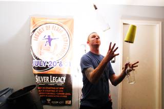 Local flair bartender Eric Parker practices in his garage in Las Vegas on Tuesday, October 2, 2012.