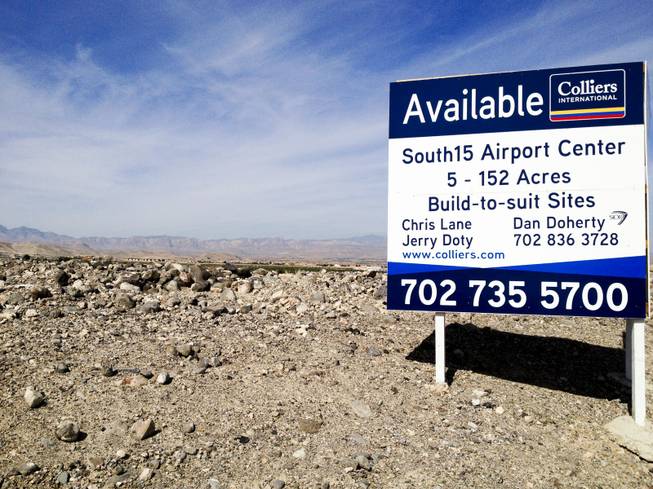 Developers are planning to build a 2 million-square-foot industrial complex in Henderson known as "South15 Airport Center." Above, a sign advertises the land to prospective tenants, Wednesday, Oct. 3, 2012.