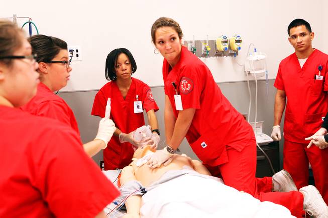 UNLV nursing students run through a simulation with a medical mannequin at the Clinical Simulation Center at UNLV's Shadow Lane campus in Las Vegas on Thursday, October 4, 2012.