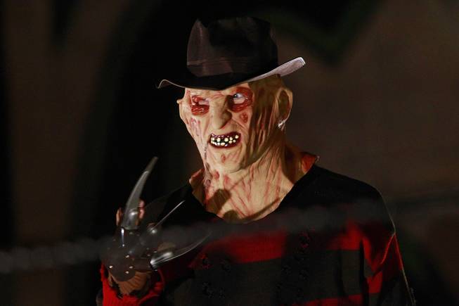 A character dressed as Freddy Kruger is seen at the Freakling Brothers Trilogy of Terror haunted houses in north west Las Vegas Saturday, Oct. 6, 2012.