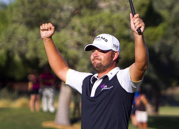 Former UNLV golfer Ryan Moore celebrates on the 18th green after winning the 2012 Justin Timberlake Shriners Hospitals for Children Open at TPC Summerlin Sunday, Oct. 7, 2012.