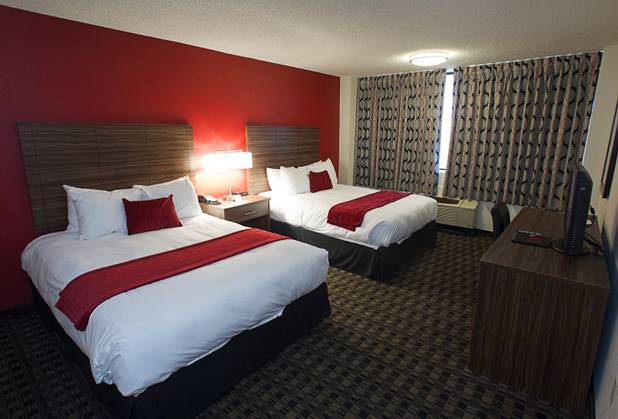 A renovated standard room with two queen beds is shown at the D Las Vegas in downtown Las Vegas Tuesday, Oct. 9, 2012. The casino, formerly Fitzgeralds, is celebrating it's rebranding and renovation with festivities this weekend.