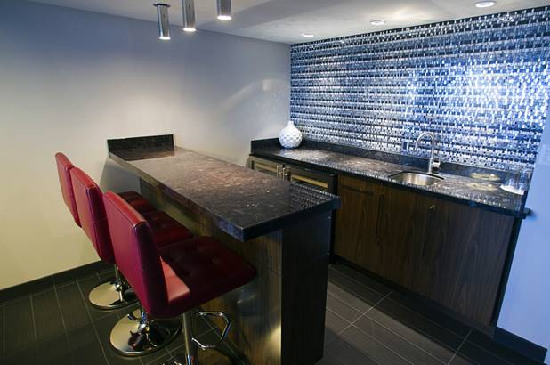 The bar in a renovated suite is shown at the D Las Vegas in downtown Las Vegas Tuesday, Oct. 9, 2012. The casino, formerly Fitzgeralds, is celebrating it's rebranding and renovation with festivities this weekend.