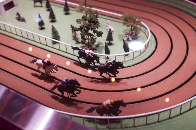 Horses race in a Sigma Derby game on a "Vintage Vegas" casino floor at the D Las Vegas in downtown Las Vegas Tuesday, Oct. 9, 2012. The casino had to reapply to have the game approved in Nevada because the original approval had expired, said CEO Derek Stevens. The casino, formerly Fitzgeralds, is celebrating it's rebranding and renovation with festivities this weekend.
