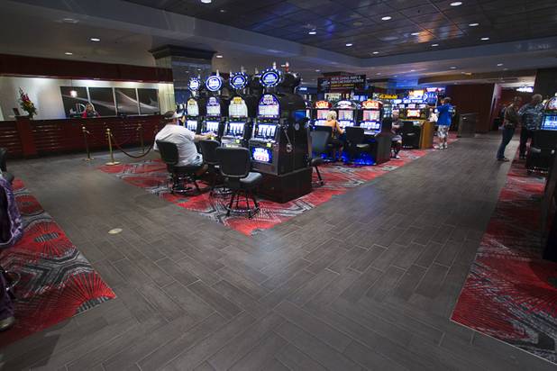 Paths to the main desk, gift shop and elevators have hard flooring to make it easier for guests with rolling luggage at the D Las Vegas in downtown Las Vegas Tuesday, Oct. 9, 2012. The casino, formerly Fitzgeralds, is celebrating it's rebranding and renovation with festivities this weekend.