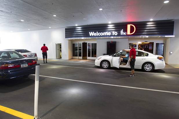 A guest picks up a car from valet at the D Las Vegas in downtown Las Vegas Tuesday, Oct. 9, 2012. The casino, formerly Fitzgeralds, is celebrating it's rebranding and renovation with festivities this weekend.