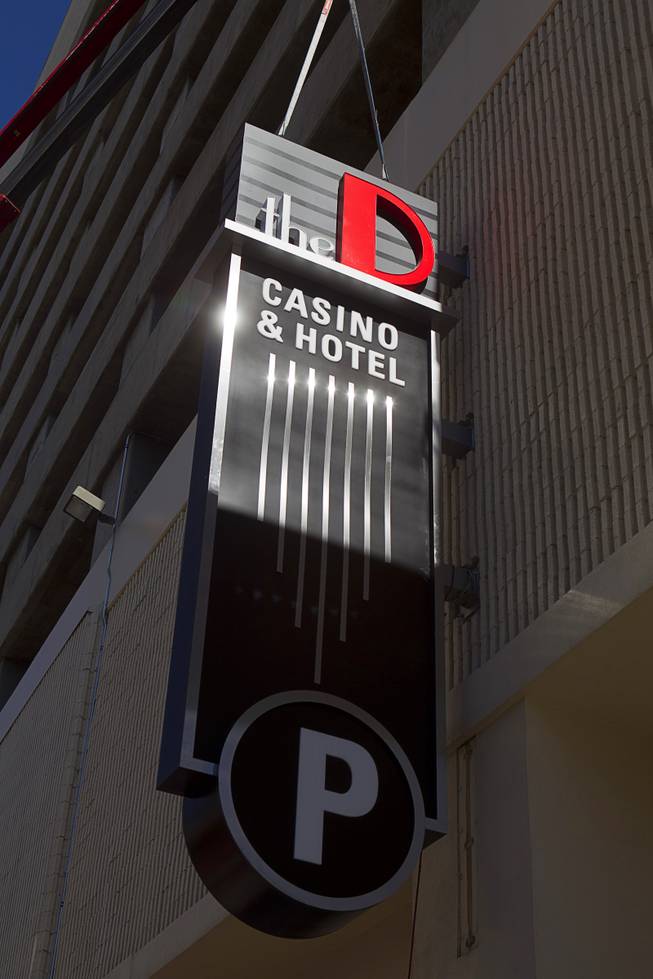 New signage is hung at the parking garage entrance to the D Las Vegas in downtown Las Vegas Tuesday, Oct. 9, 2012. The casino, formerly Fitzgeralds, is celebrating it's rebranding and renovation with festivities this weekend.