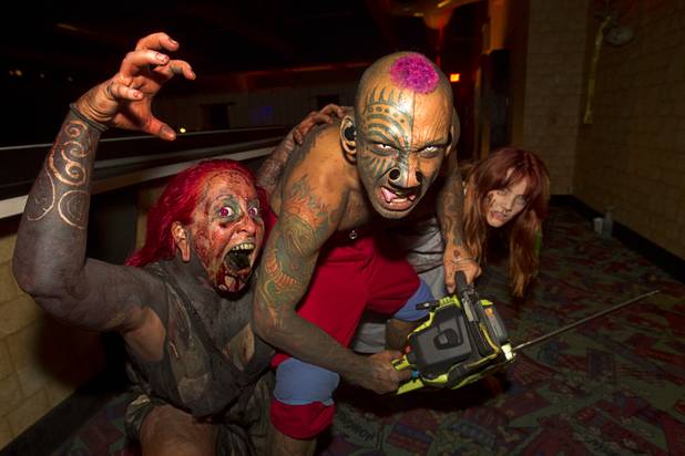 A few scary characters are shown during a VIP/media night event at the Amazing Jonathan's SCREAMont Experiment haunted hotel at the Las Vegas Club in downtown Las Vegas Thursday, Oct. 10, 2012. The haunted hotel is open nightly from 7 p.m. to midnight.