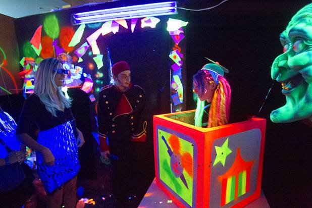 A guest stops in a 3-D playroom during a VIP/media night event at the Amazing Jonathan's SCREAMont Experiment haunted hotel at the Las Vegas Club in downtown Las Vegas Thursday, Oct. 10, 2012. The haunted hotel is open nightly from 7 p.m. to midnight.