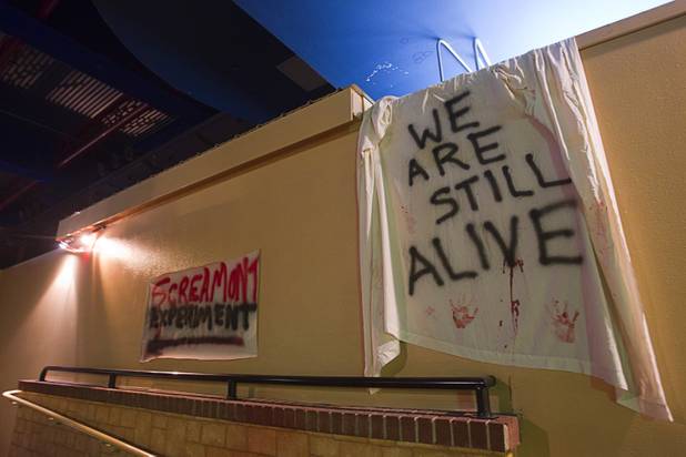 A banner hangs from a wall during a VIP/media night event at the Amazing Jonathan's SCREAMont Experiment haunted hotel at the Las Vegas Club in downtown Las Vegas Thursday, Oct. 10, 2012. The haunted hotel is open nightly from 7 p.m. to midnight.