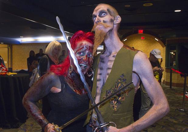 Kelvikta the Blade and Andrew S. of the SwingShift SideShow pose during a VIP/media night event at the Amazing Jonathan's SCREAMont Experiment haunted hotel at the Las Vegas Club in downtown Las Vegas Thursday, Oct. 10, 2012. The haunted hotel is open nightly from 7 p.m. to midnight.