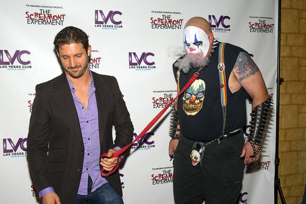 J.T. Mollner and Scorch the Clown of Freakling Bros. arrive for a VIP/media night event at the Amazing Jonathan's SCREAMont Experiment haunted hotel at the Las Vegas Club in downtown Las Vegas Thursday, Oct. 10, 2012. The haunted hotel is open nightly from 7 p.m. to midnight.