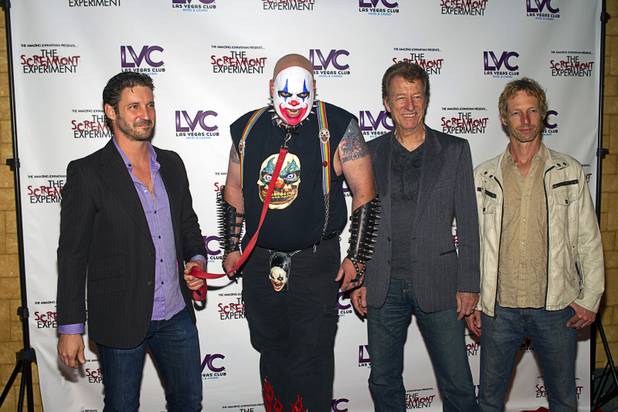 From left, J.T. Mollner, Scorch the Clown, Duke Mollner and Daniel Mollner of Freakling Bros. arrive for a VIP/media night event at the Amazing Jonathan's SCREAMont Experiment haunted hotel at the Las Vegas Club in downtown Las Vegas Thursday, Oct. 10, 2012. The haunted hotel is open nightly from 7 p.m. to midnight.