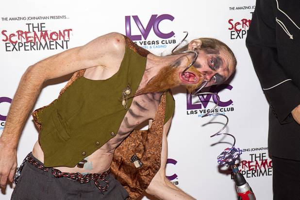 Andrew S. performs on the red carpet during a VIP/media night event at the Amazing Jonathan's SCREAMont Experiment haunted hotel at the Las Vegas Club in downtown Las Vegas Thursday, Oct. 10, 2012. The haunted hotel is open nightly from 7 p.m. to midnight.