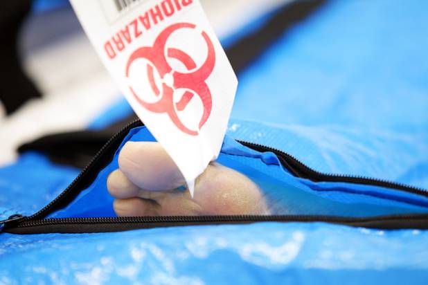 A body with a toe tag is inside the cooler at the Clark County Office of the Coroner/Medical Examiner in Las Vegas.