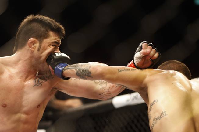 Rony Jason, from Brazil, left, fights Sam Sicilia, from the U.S., during their featherweight mixed martial arts bout at the Ultimate Fighting Championship (UFC) 153 in Rio de Janeiro, Brazil, Saturday, Oct. 13, 2012. Jason defeated Sicilia. 